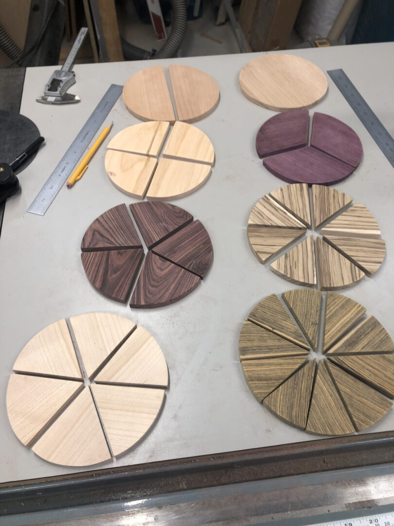 A table with many different colored wooden discs.